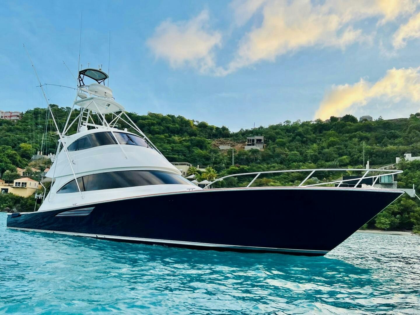 a boat on the water aboard POUR INTENTIONS Yacht for Sale