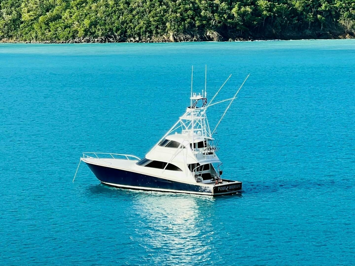 a boat on the water aboard POUR INTENTIONS Yacht for Sale