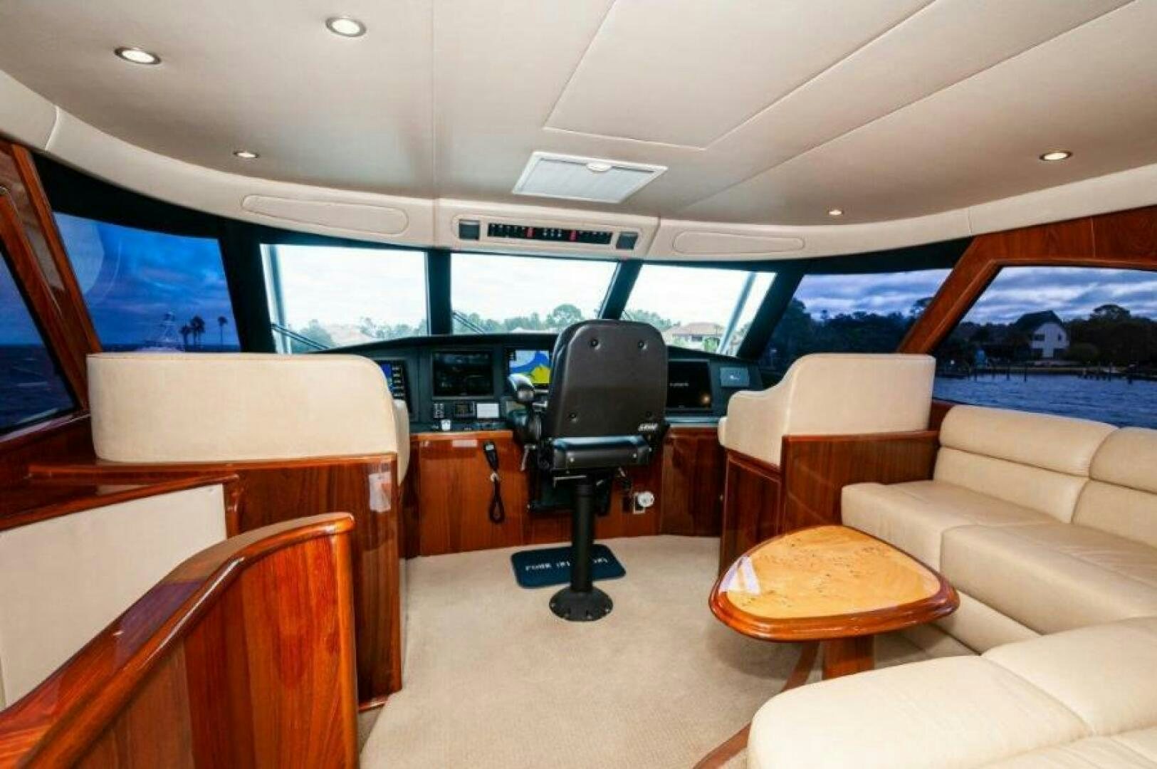 inside of a vehicle with a desk and chairs and a tv aboard POUR INTENTIONS Yacht for Sale