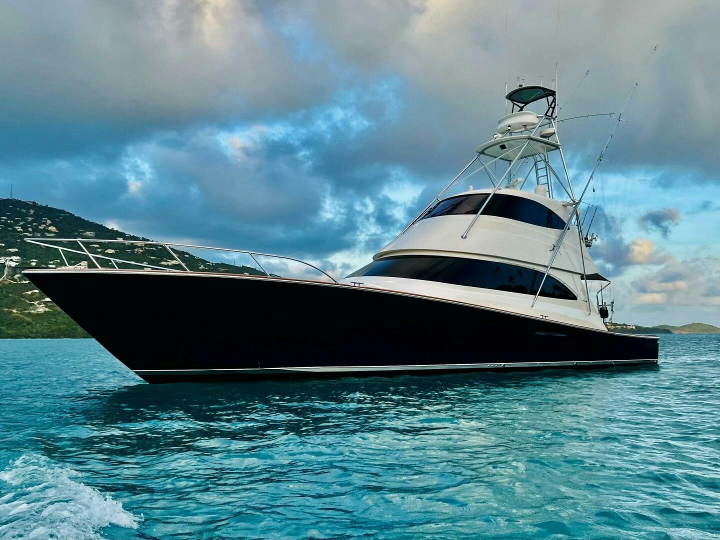 a boat in the water aboard POUR INTENTIONS Yacht for Sale
