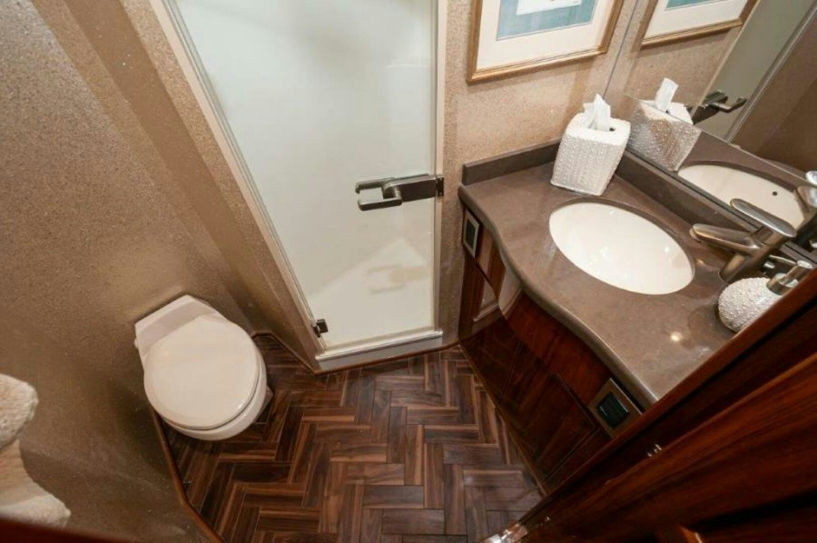 a bathroom with a sink and a toilet aboard POUR INTENTIONS Yacht for Sale