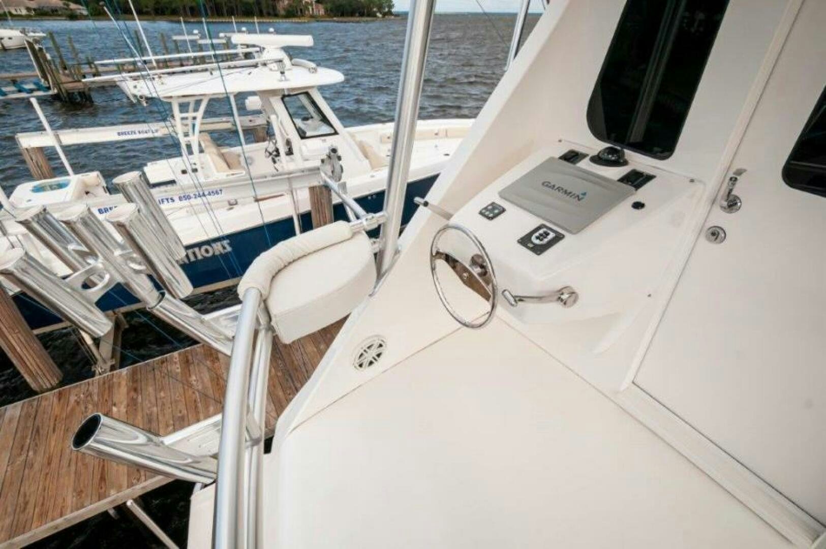 a boat on the water aboard POUR INTENTIONS Yacht for Sale