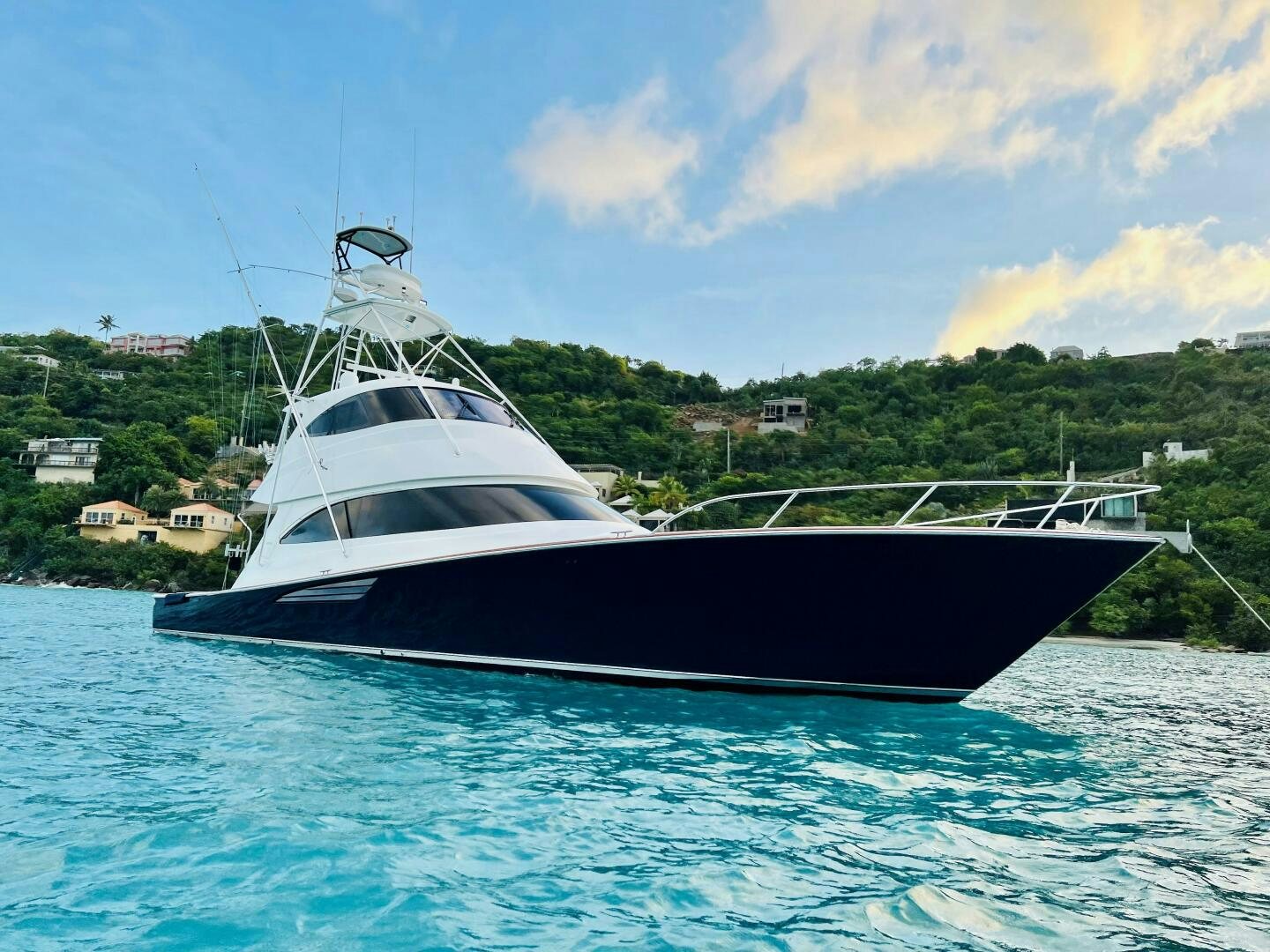 a boat on the water aboard POUR INTENTIONS Yacht for Sale