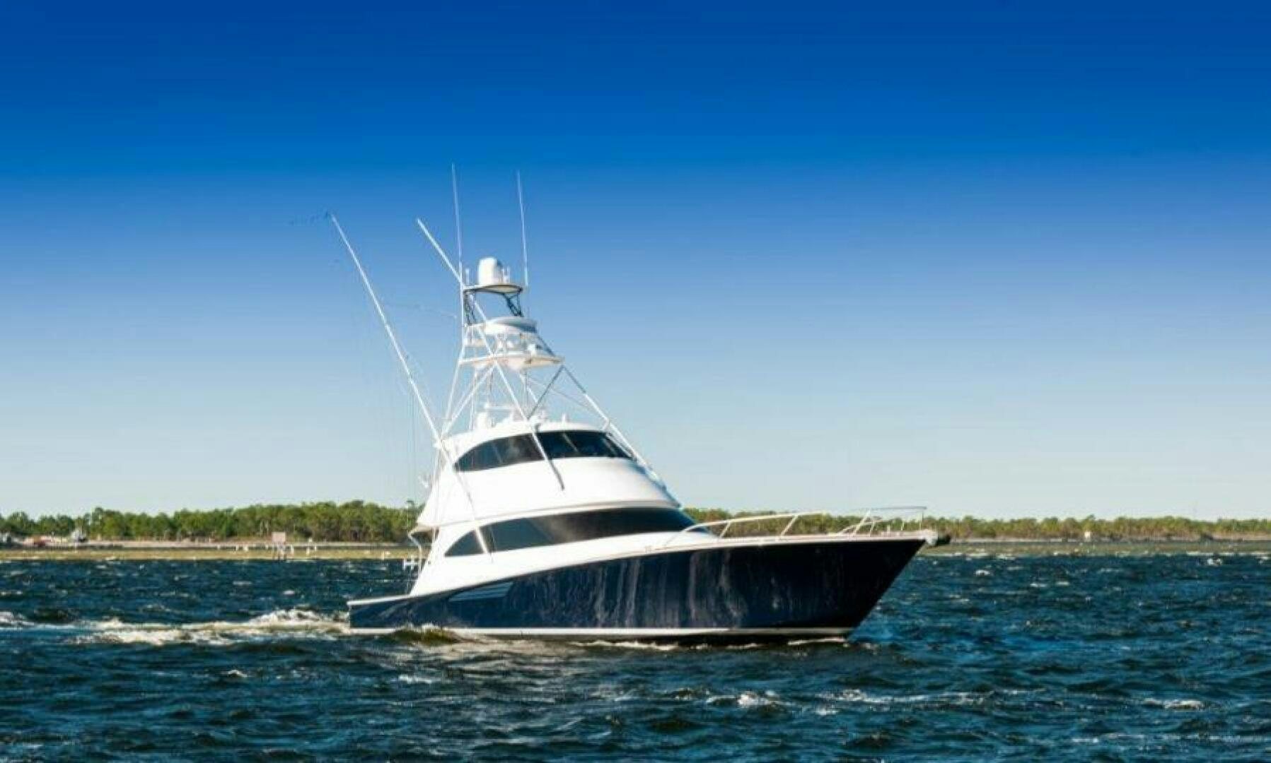 a boat in the water aboard POUR INTENTIONS Yacht for Sale