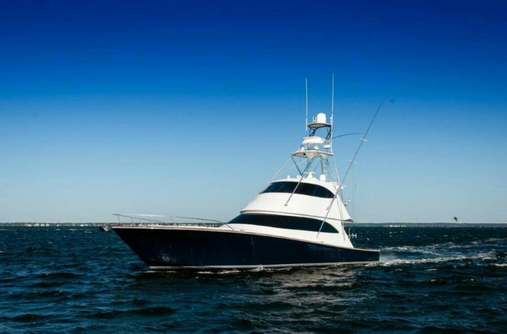 a boat in the water aboard POUR INTENTIONS Yacht for Sale