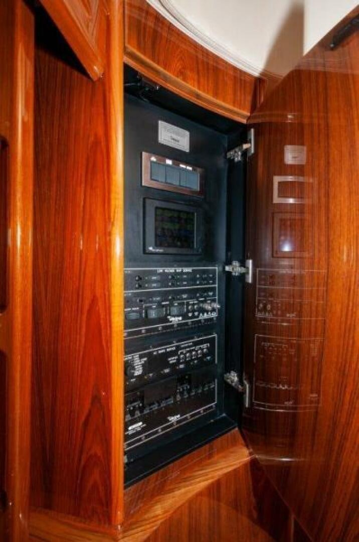 a cabinet with a computer inside aboard POUR INTENTIONS Yacht for Sale