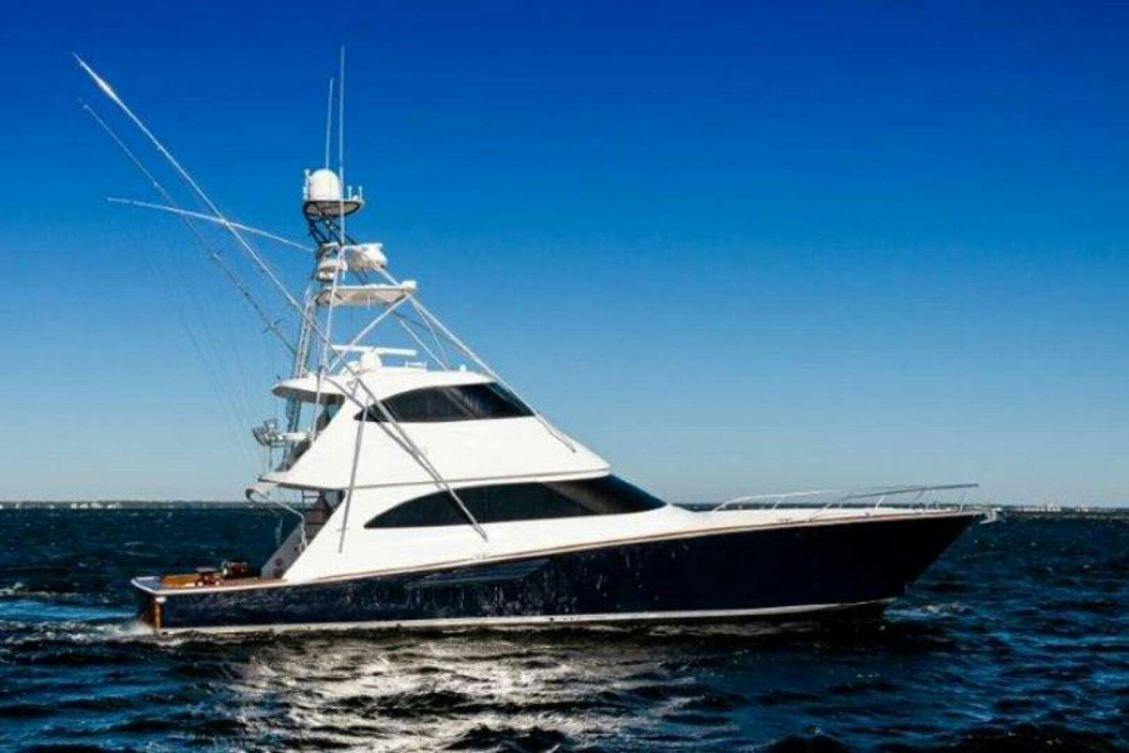 a boat in the water aboard POUR INTENTIONS Yacht for Sale