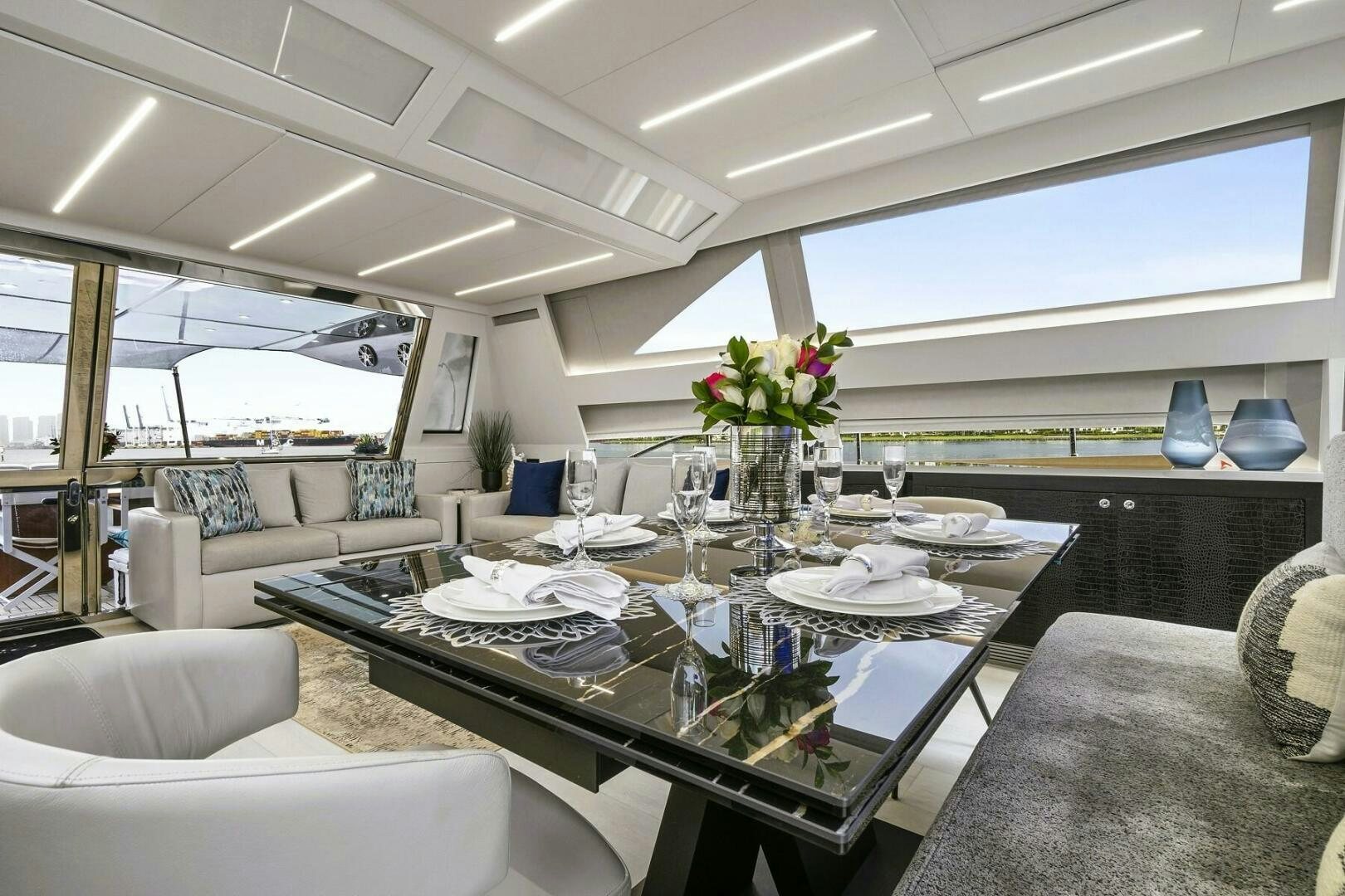 a large dining room with a large window aboard GYPSEA Yacht for Sale