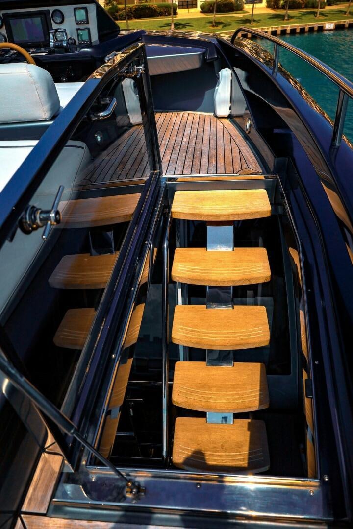 a boat with wood planks aboard GYPSEA Yacht for Sale
