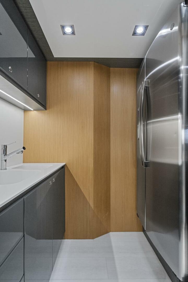 a bathroom with a stainless steel shower unit aboard GYPSEA Yacht for Sale