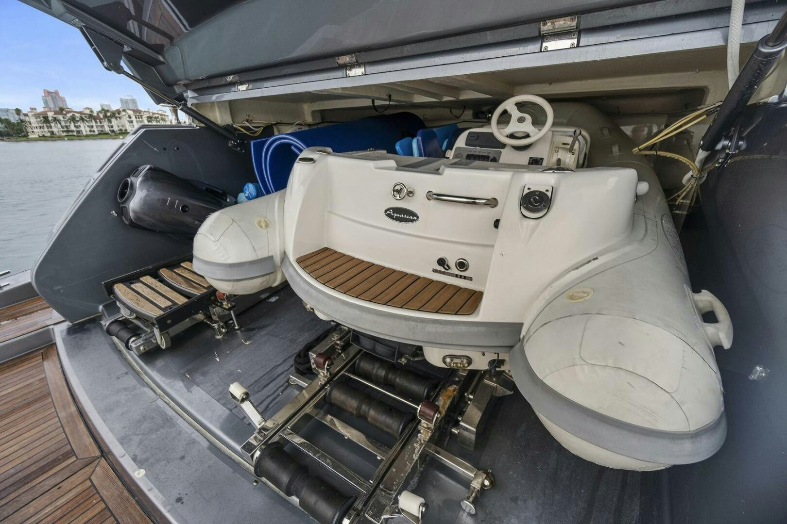 a car with a large engine aboard GYPSEA Yacht for Sale