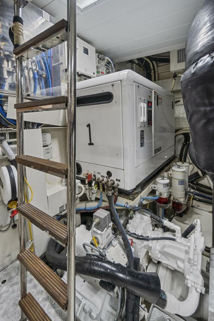 a machine with a large piece of equipment in it aboard GYPSEA Yacht for Sale