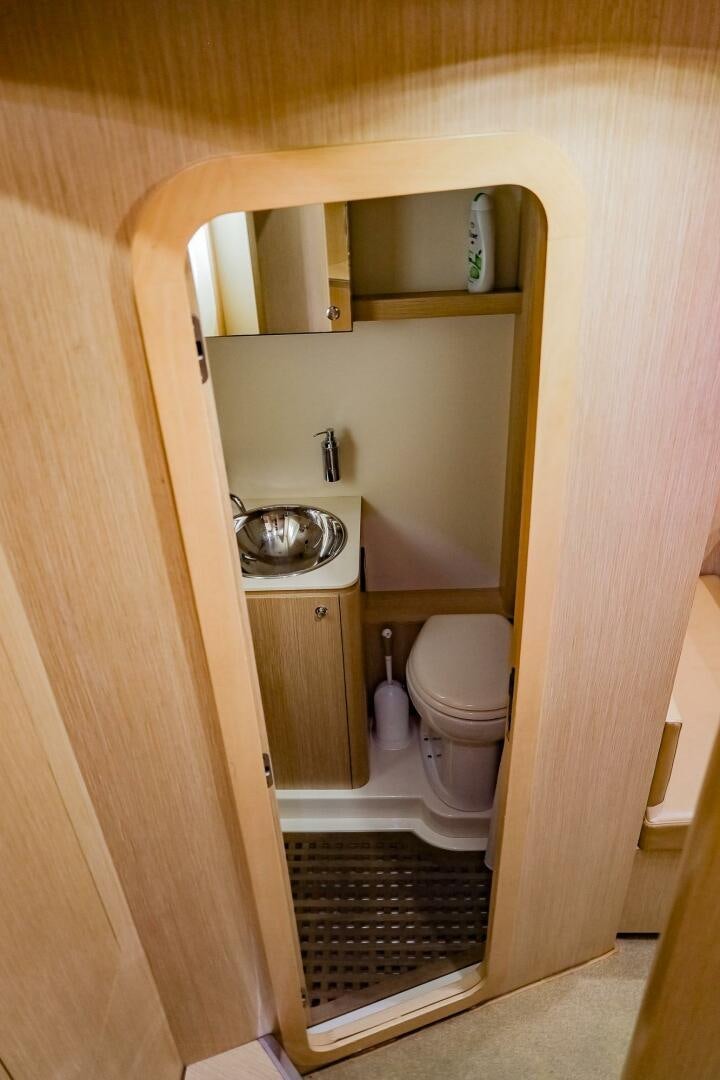 a bathroom with a sink and toilet aboard GYPSEA Yacht for Sale