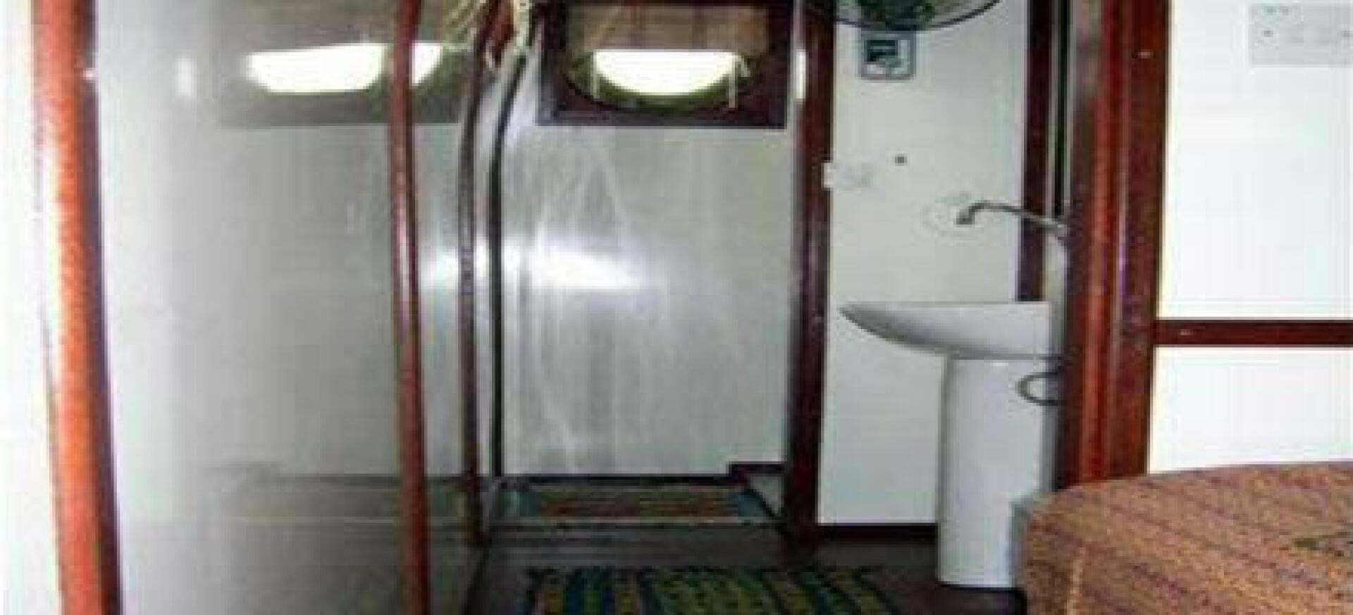 a shower with a sink aboard HAGANES Yacht for Sale