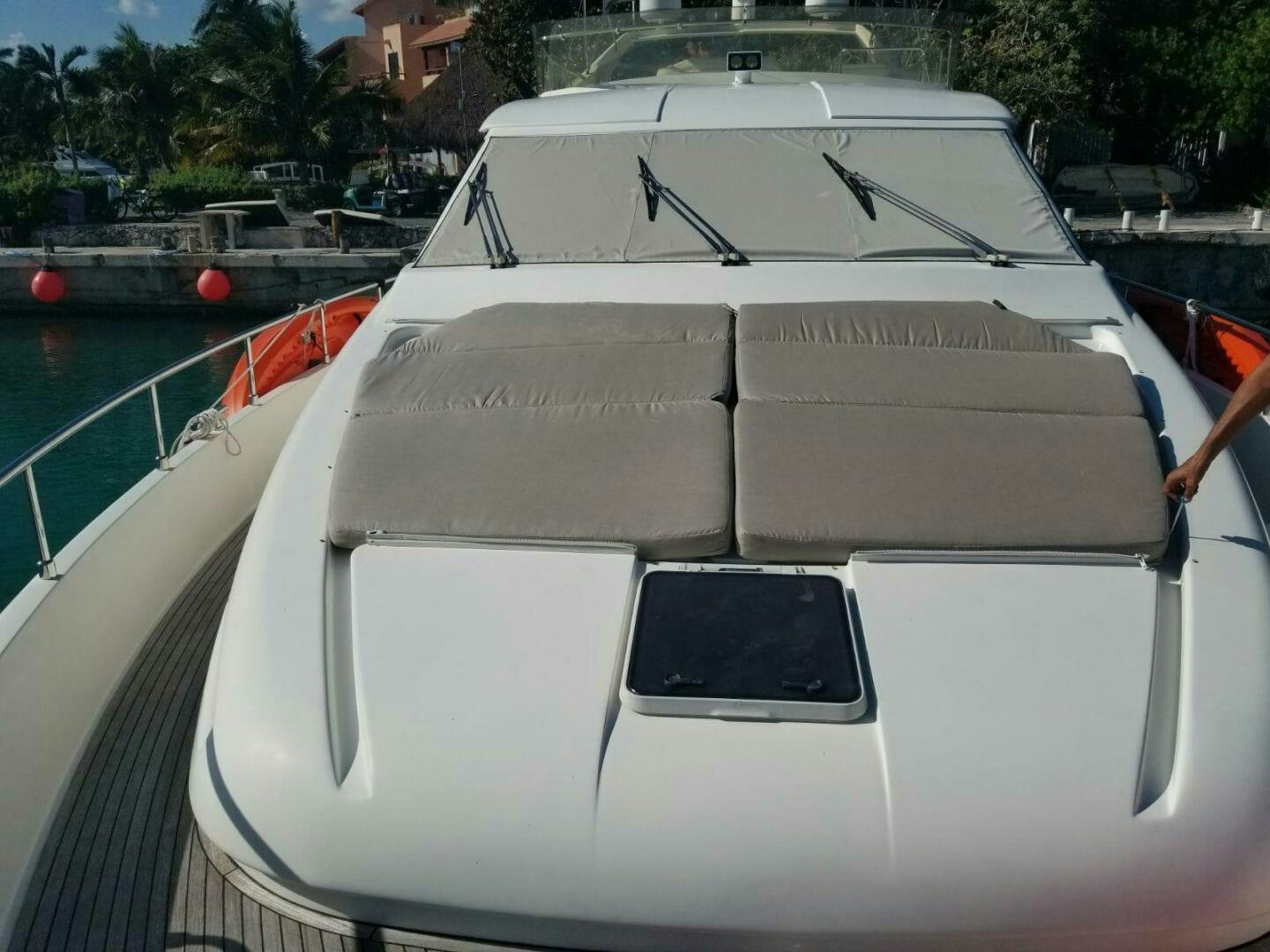 a white car parked on a dock aboard SEDROP Yacht for Sale