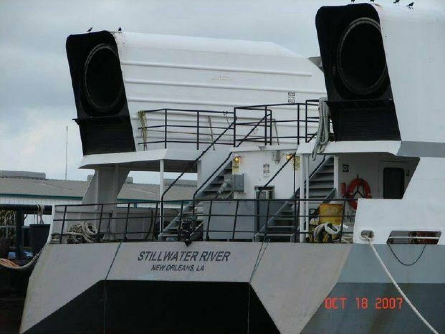 a large white boat with a black light on it aboard STILLWATER RIVER Yacht for Sale