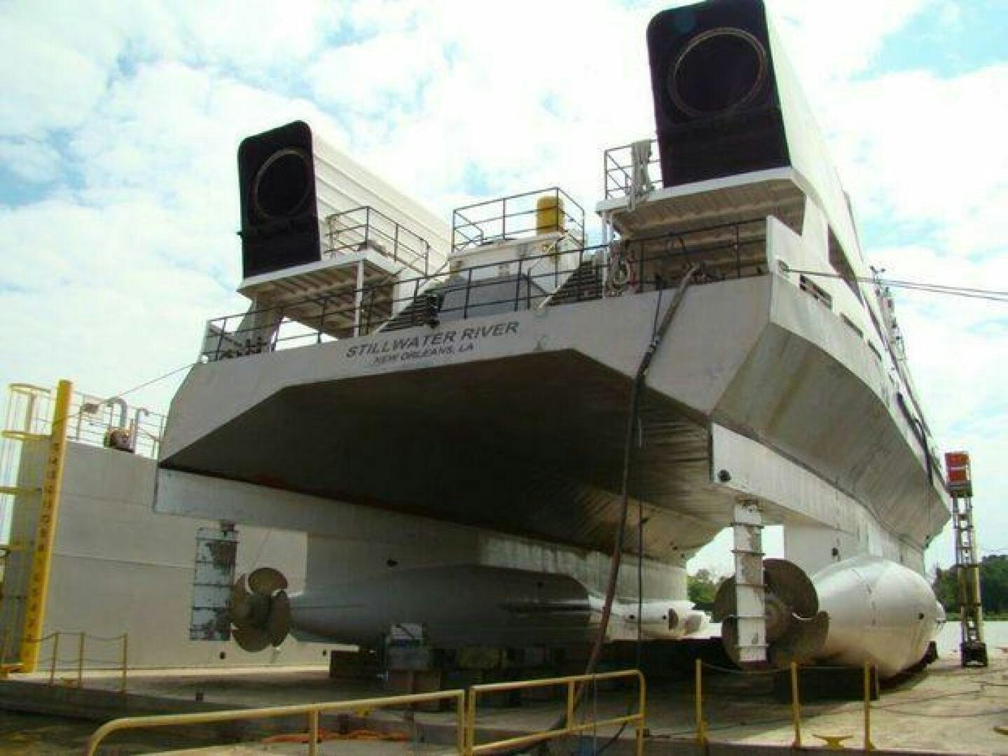 a large white ship aboard STILLWATER RIVER Yacht for Sale