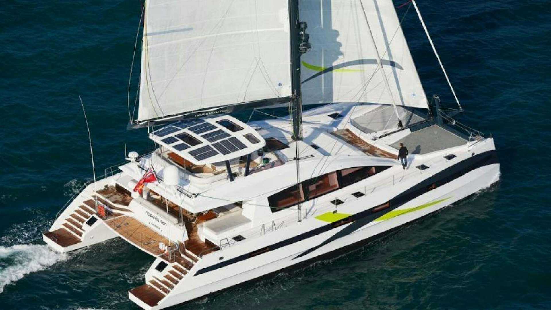 a white boat on the water aboard NDSE Yacht for Sale