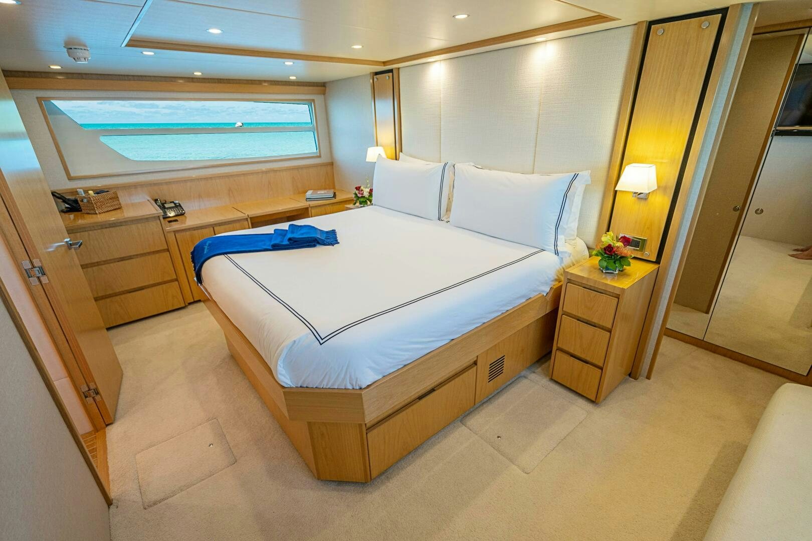 a room with a bed and a desk aboard MARYBELLE Yacht for Sale