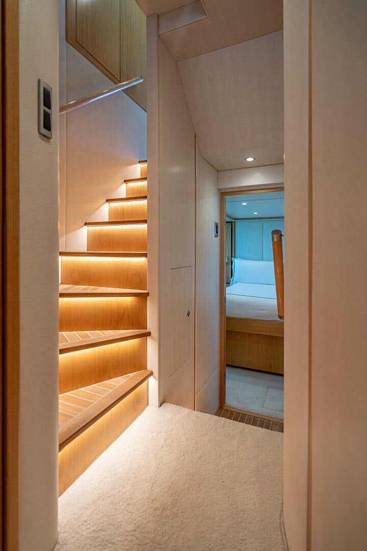 a hallway with a white door aboard MARYBELLE Yacht for Sale