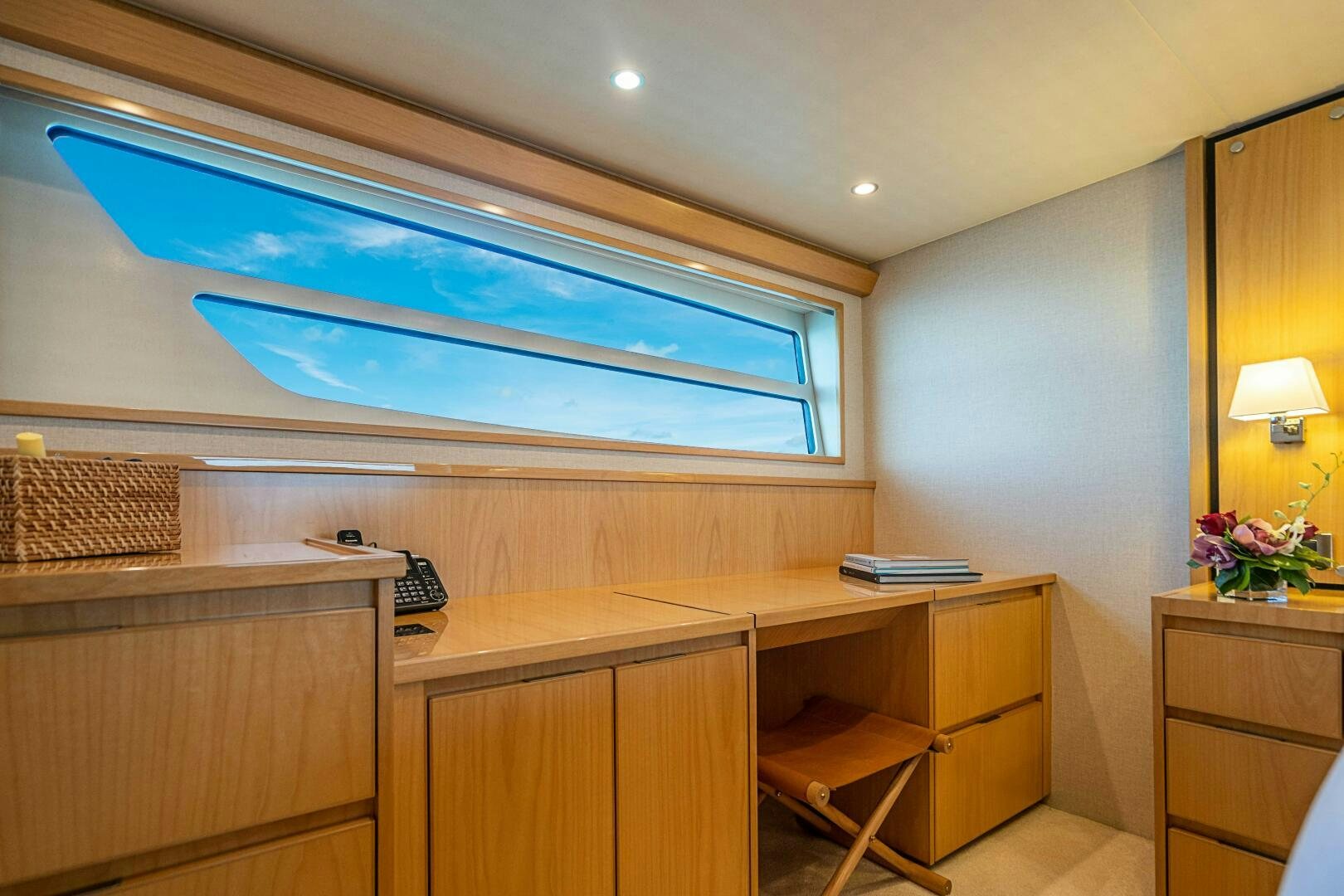 a room with a desk and a window aboard MARYBELLE Yacht for Sale