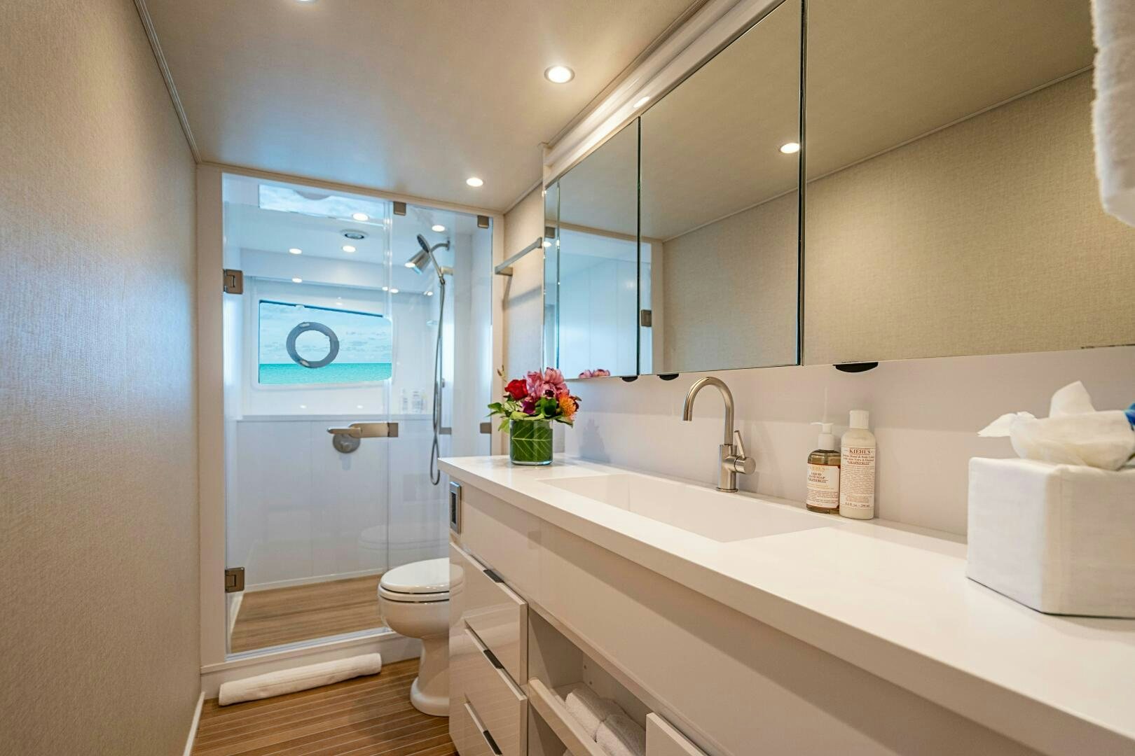 a bathroom with a sink and a shower aboard MARYBELLE Yacht for Sale