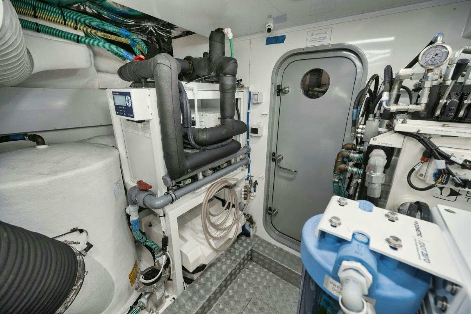 a room with a machine aboard HOOKED HER Yacht for Sale