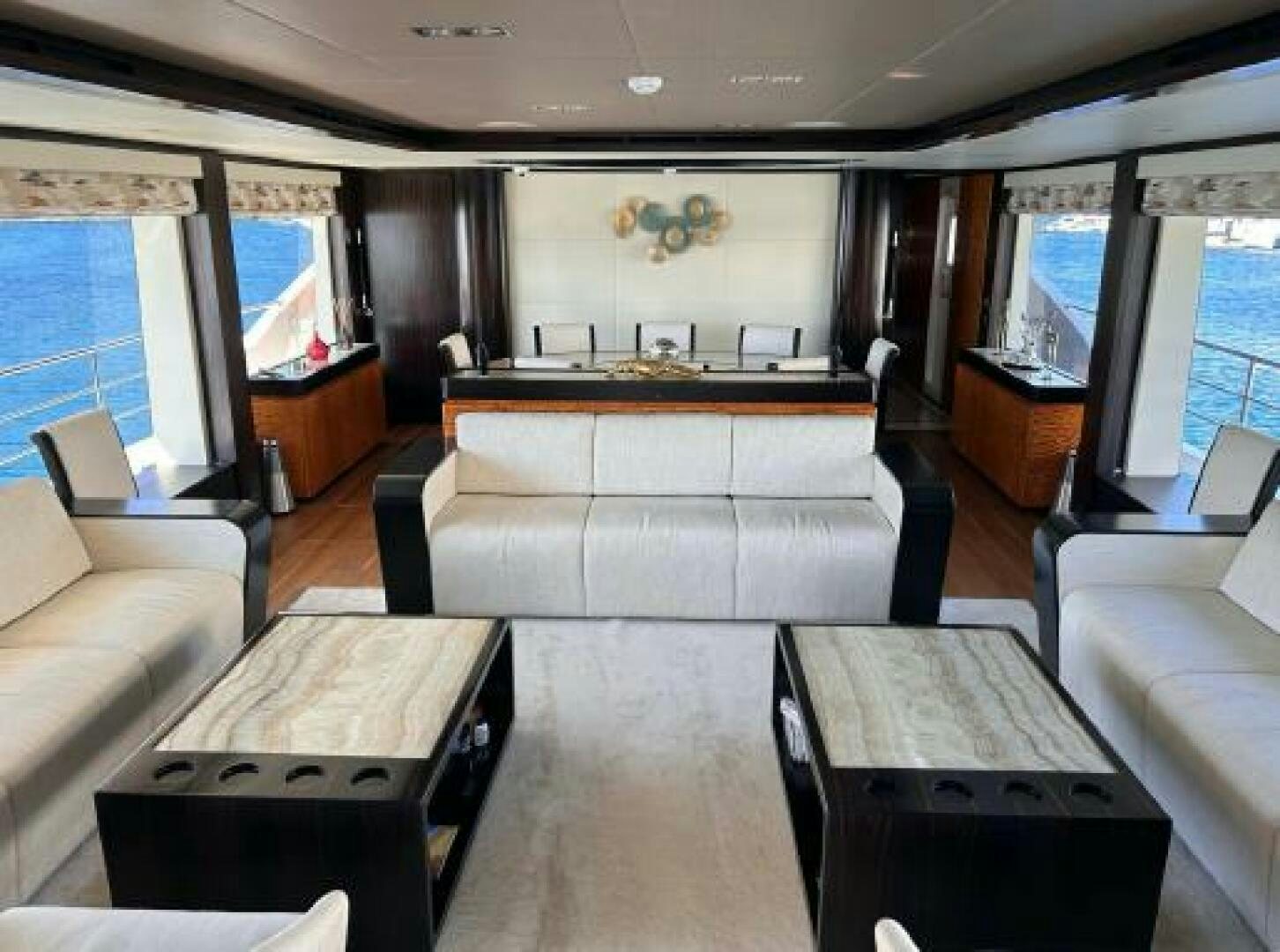 a room with a couch and a table aboard PITERLAND II Yacht for Sale