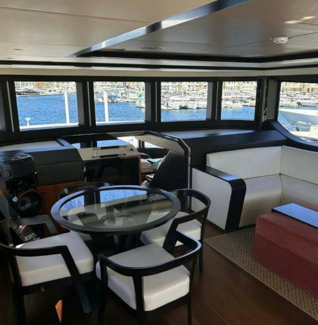 a bus with tables and chairs aboard PITERLAND II Yacht for Sale
