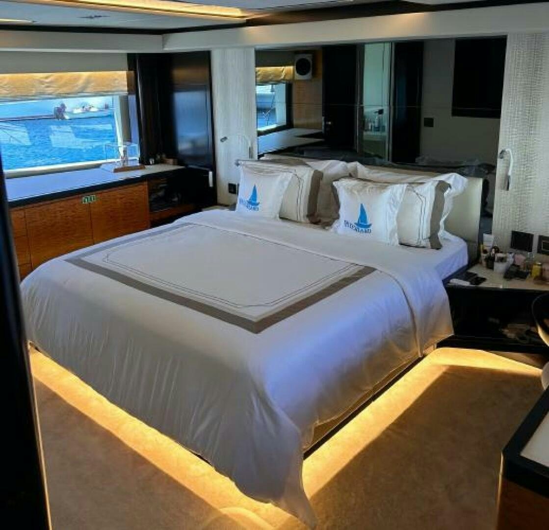 a bedroom with a large bed aboard PITERLAND II Yacht for Sale