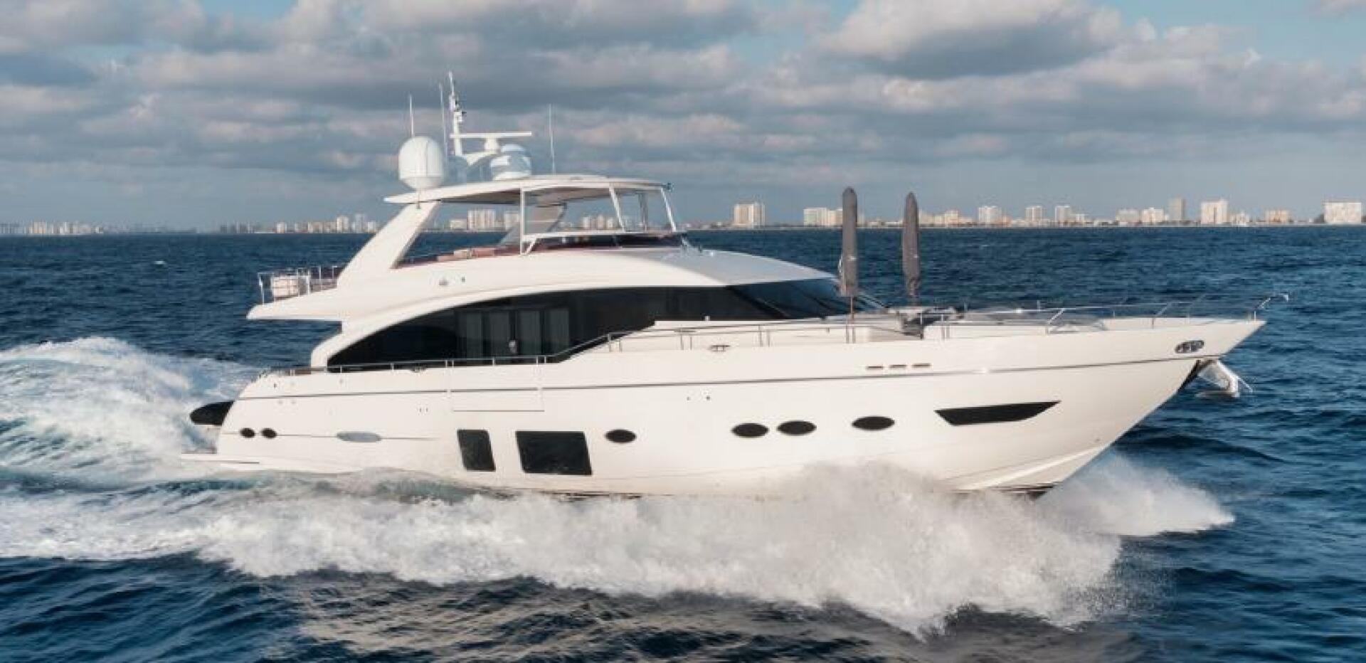 a white yacht on the water aboard SOLDAYA Yacht for Sale