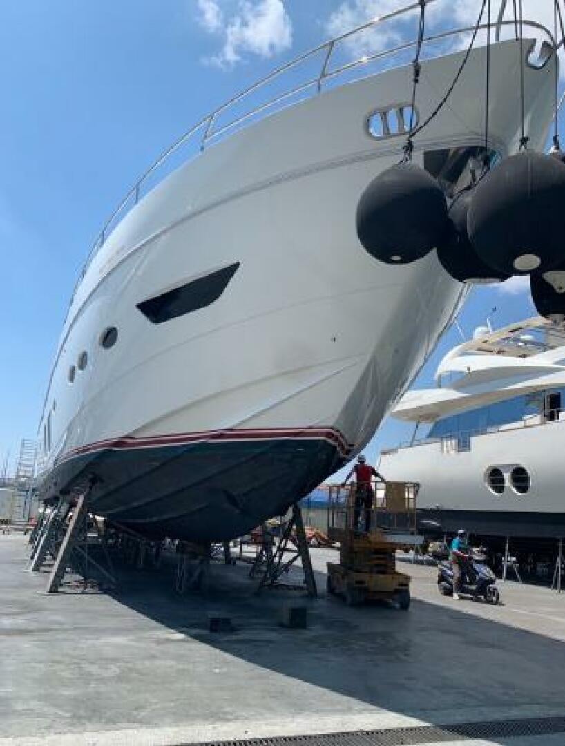 a large airplane is being loaded with luggage aboard SOLDAYA Yacht for Sale