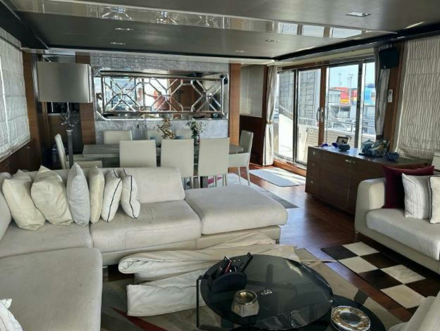 a living room with a large window aboard SOLDAYA Yacht for Sale