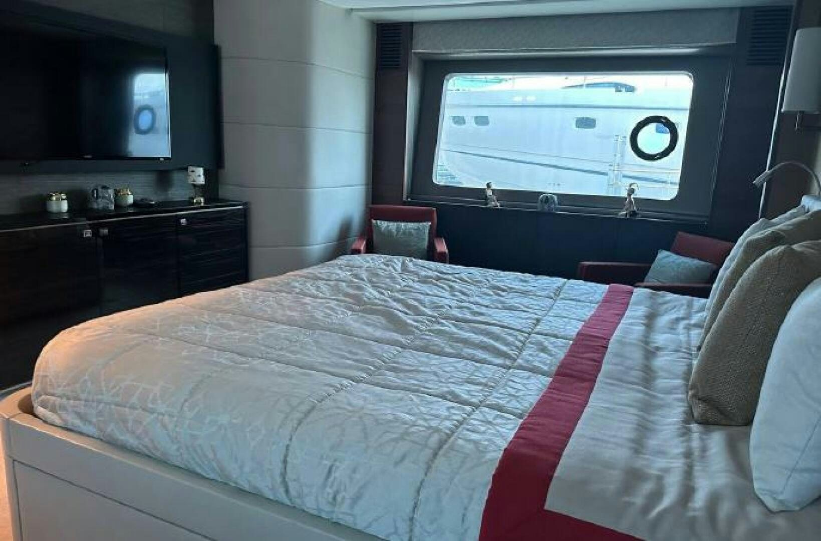 a bed with a white sheet aboard SOLDAYA Yacht for Sale