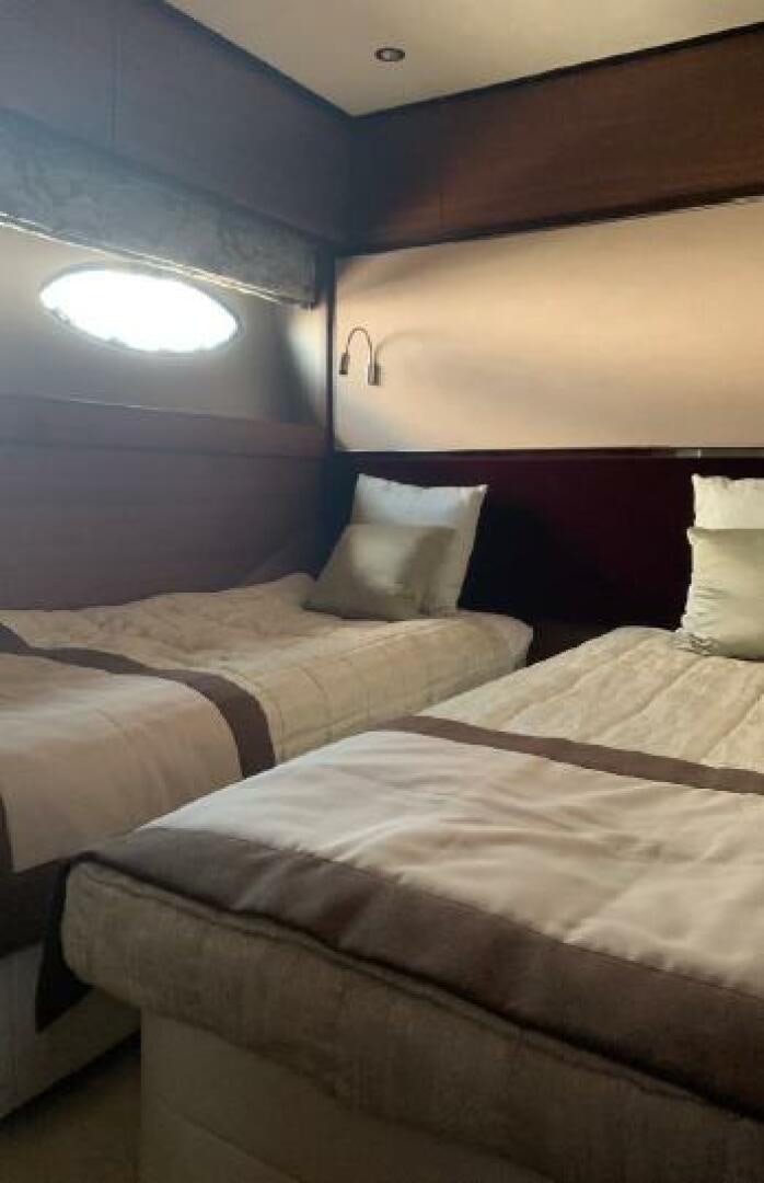 a couple of beds in a room aboard SOLDAYA Yacht for Sale