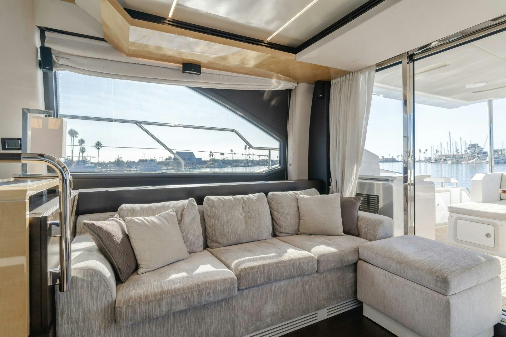 a couch in a room aboard TCHANTCHES Yacht for Sale