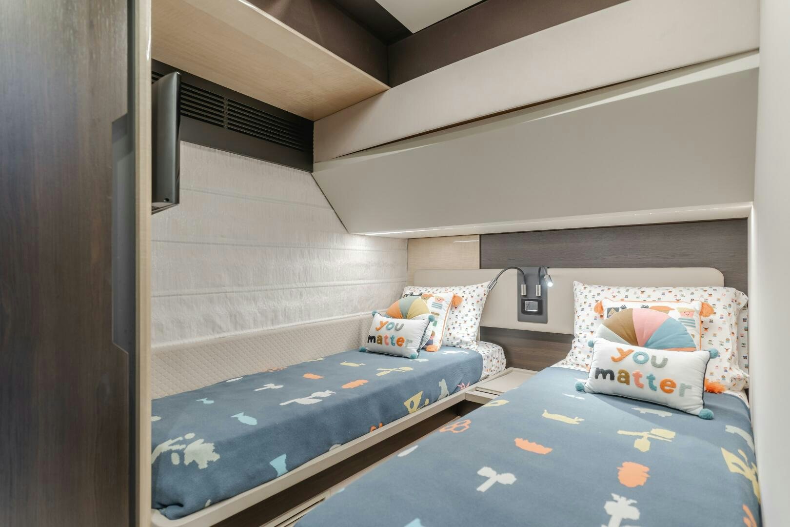 a couple of beds in a room aboard TCHANTCHES Yacht for Sale
