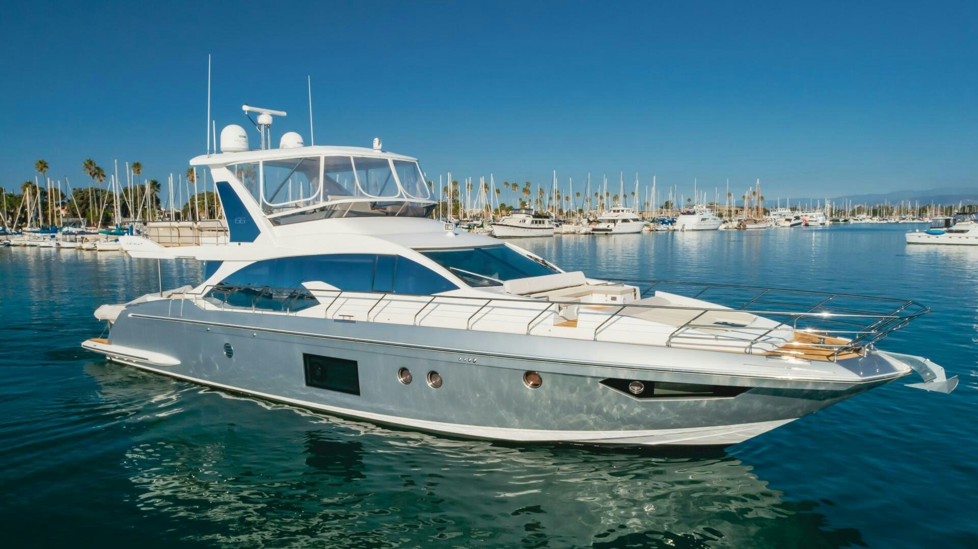 a white yacht in the water aboard TCHANTCHES Yacht for Sale