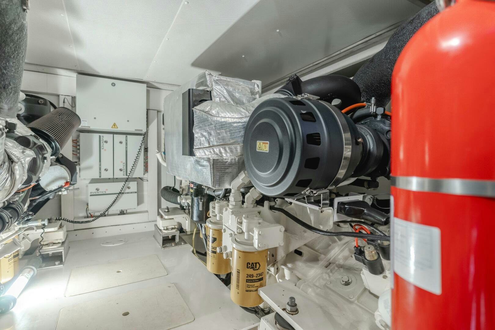 a large machine in a room aboard TCHANTCHES Yacht for Sale