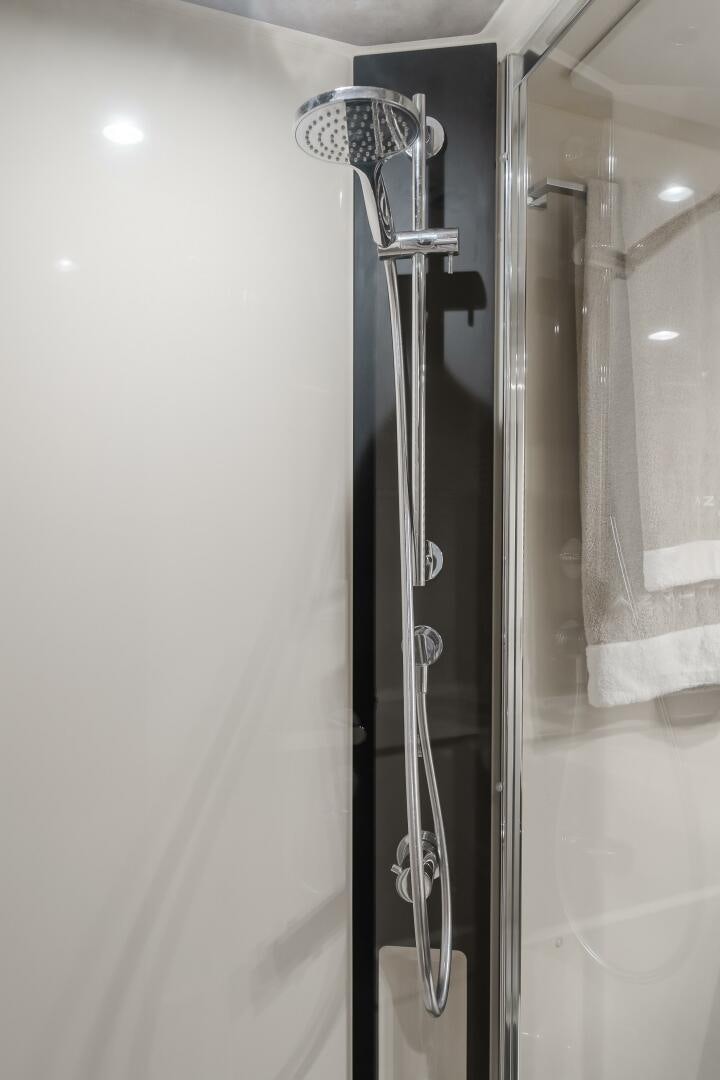 a shower unit with a glass door aboard TCHANTCHES Yacht for Sale