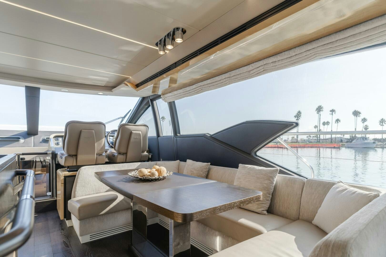 a table and chairs on a boat aboard TCHANTCHES Yacht for Sale