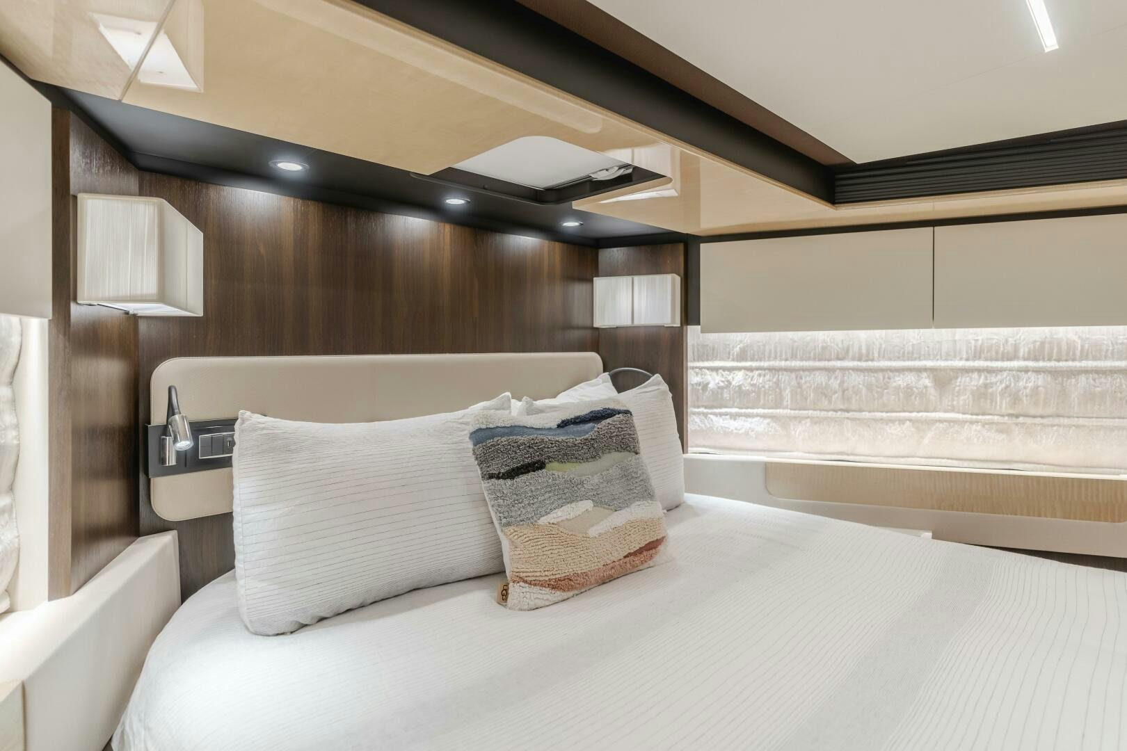a bed with pillows aboard TCHANTCHES Yacht for Sale