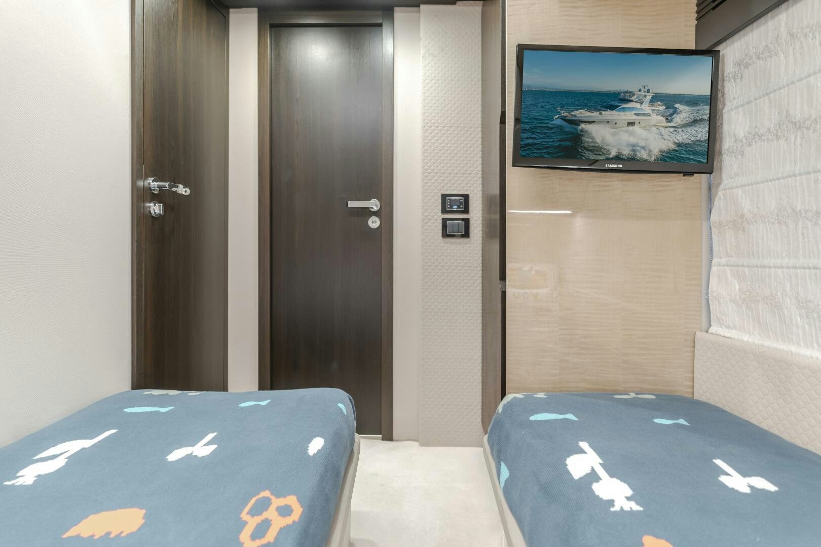 a room with a television and a table with a pool table aboard TCHANTCHES Yacht for Sale