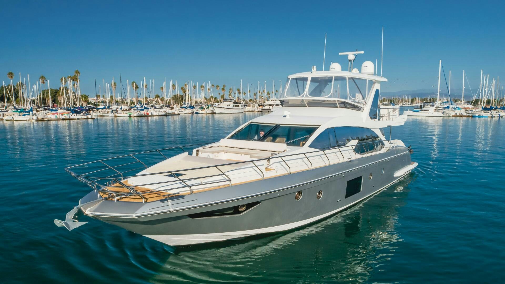 a white yacht in the water aboard TCHANTCHES Yacht for Sale