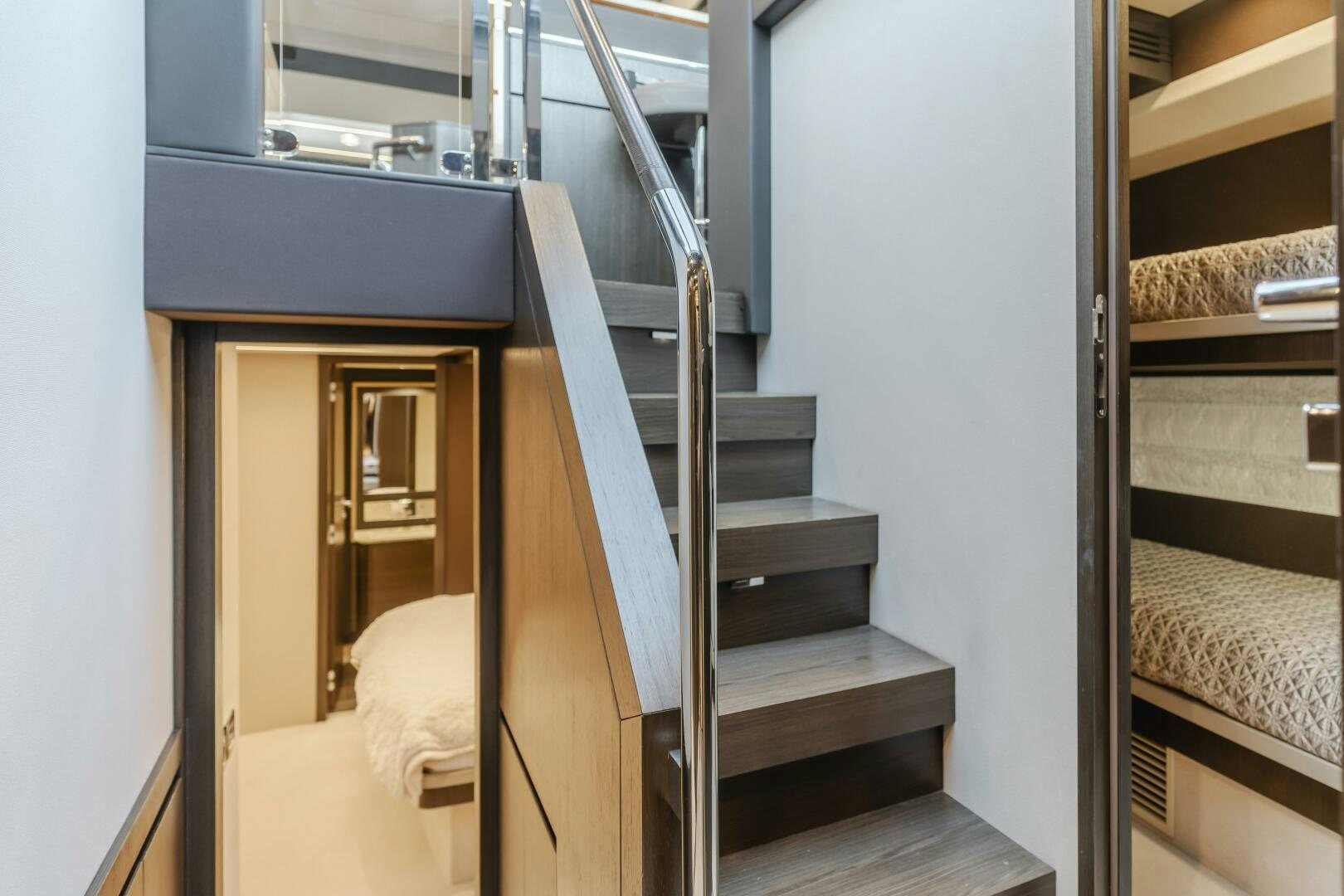 a set of stairs leading to a bedroom aboard TCHANTCHES Yacht for Sale