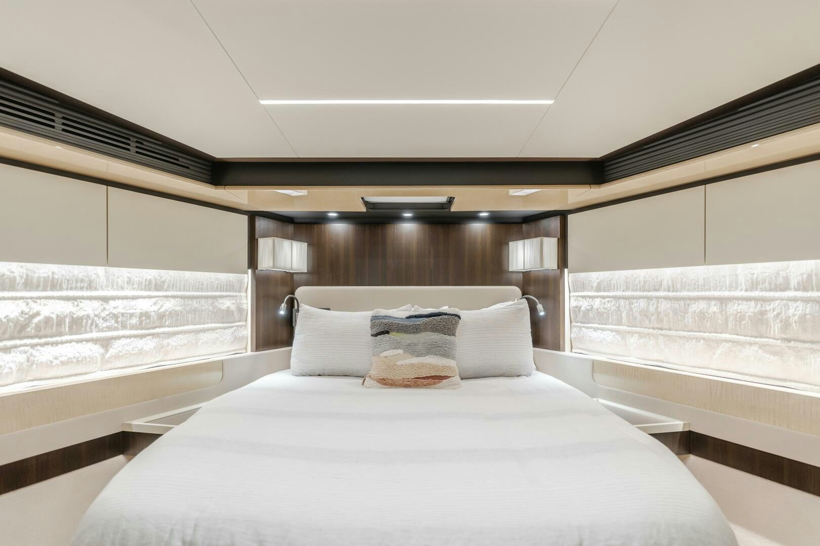 a room with a couple of beds aboard TCHANTCHES Yacht for Sale