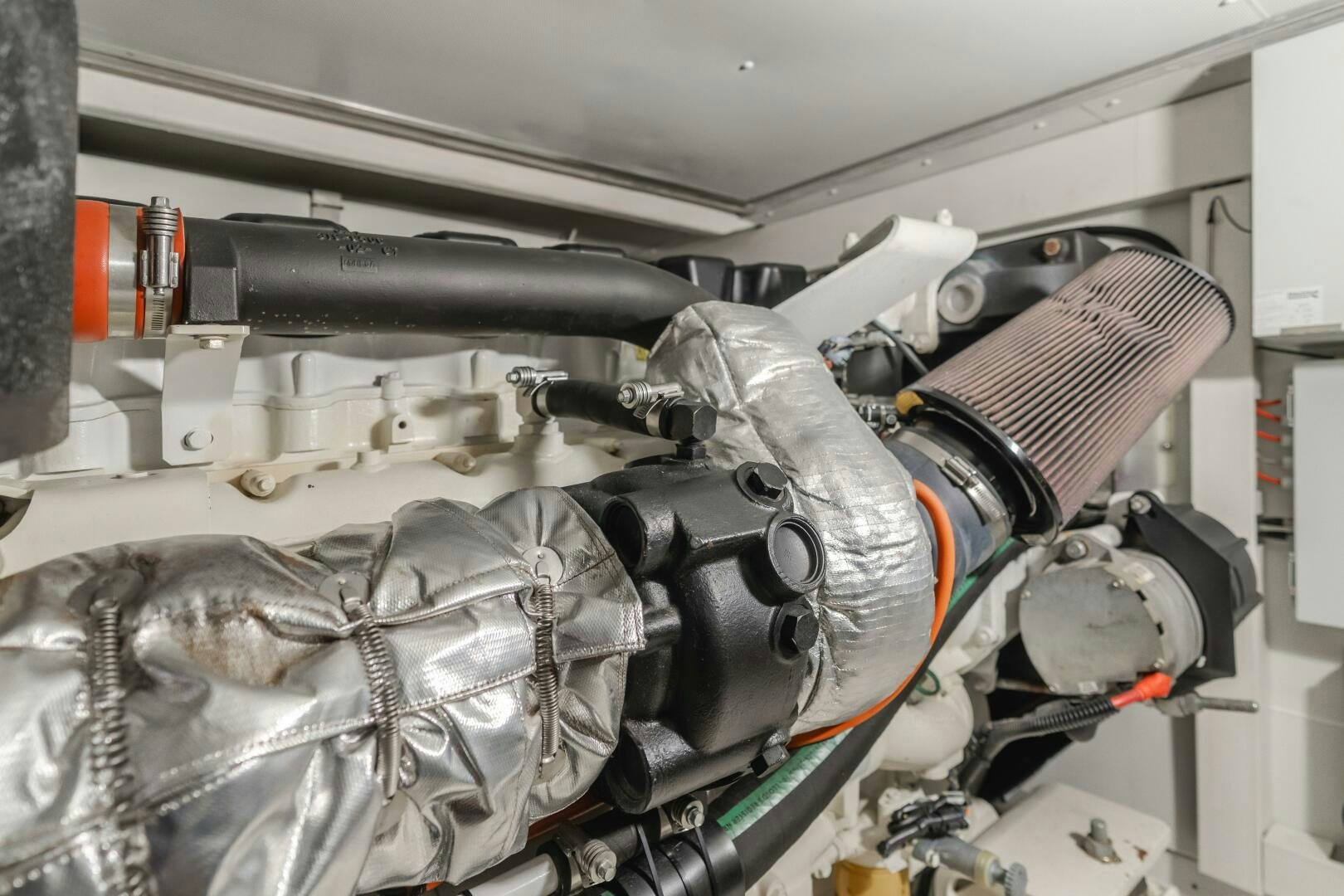 a close-up of a car engine aboard TCHANTCHES Yacht for Sale