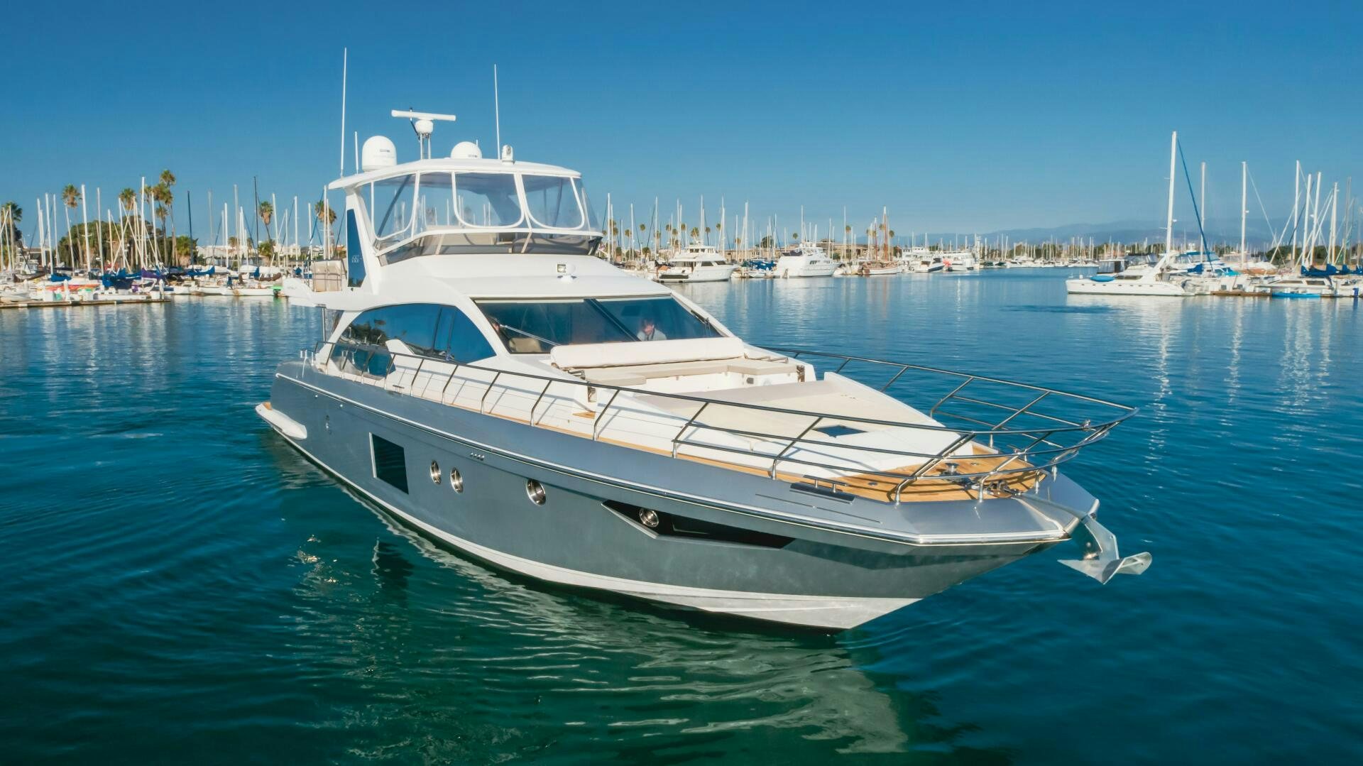 a white yacht in the water aboard TCHANTCHES Yacht for Sale