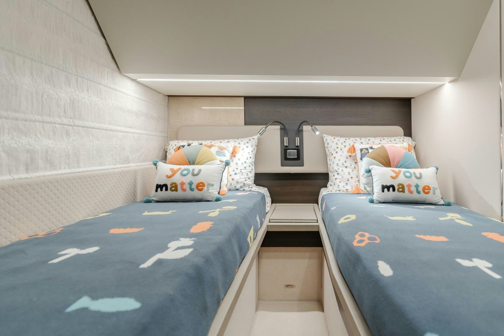a couple of beds in a room aboard TCHANTCHES Yacht for Sale