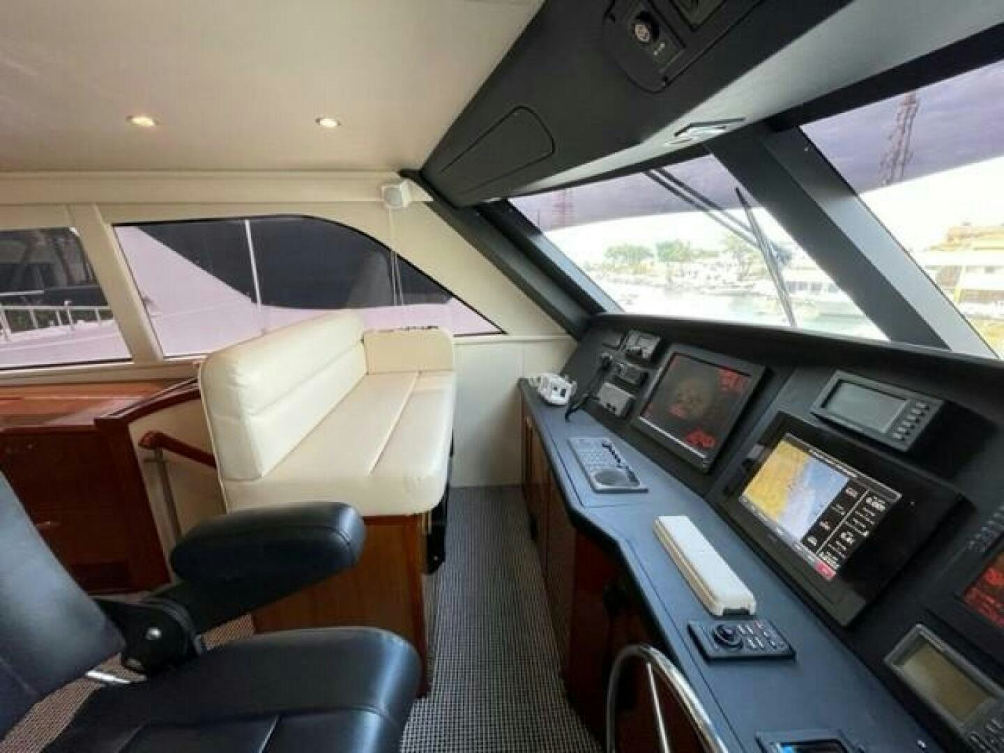 a vehicle with a desk and a computer aboard 6 C Yacht for Sale